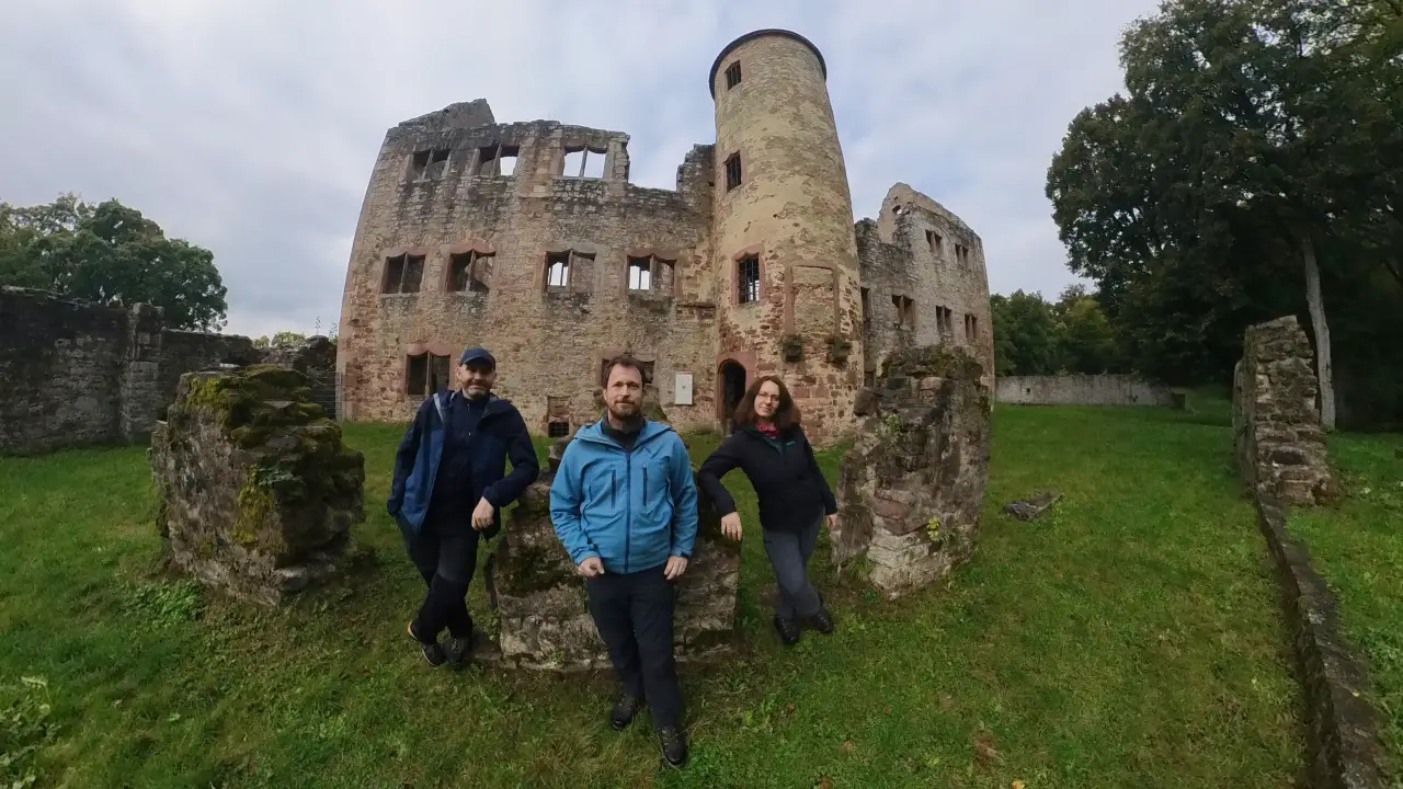 The three of us posing in front of the ruins like castle lords and ladies