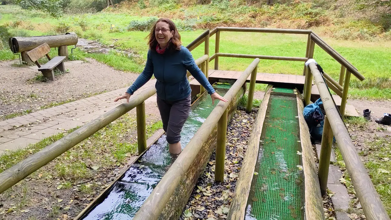 Manu in a Kneipp basin. She's smiling with slight pain - apparently the water is quite cold.